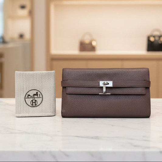 Hermès Kelly Classic Longue Wallet — Chocolate Taurillon Clemence, Palladium