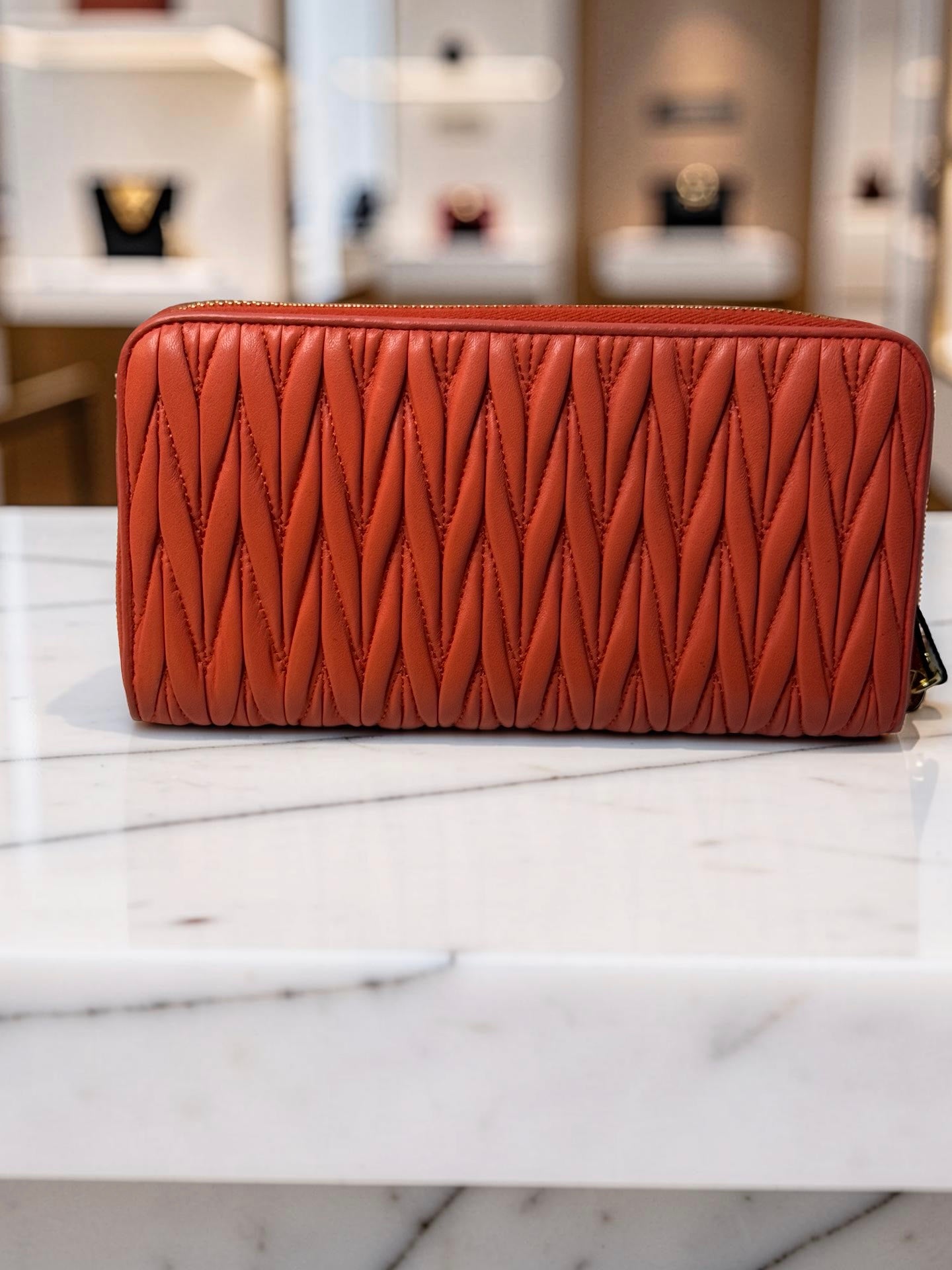 Miu Miu Matelassé Zip-Around Continental Wallet — Coral